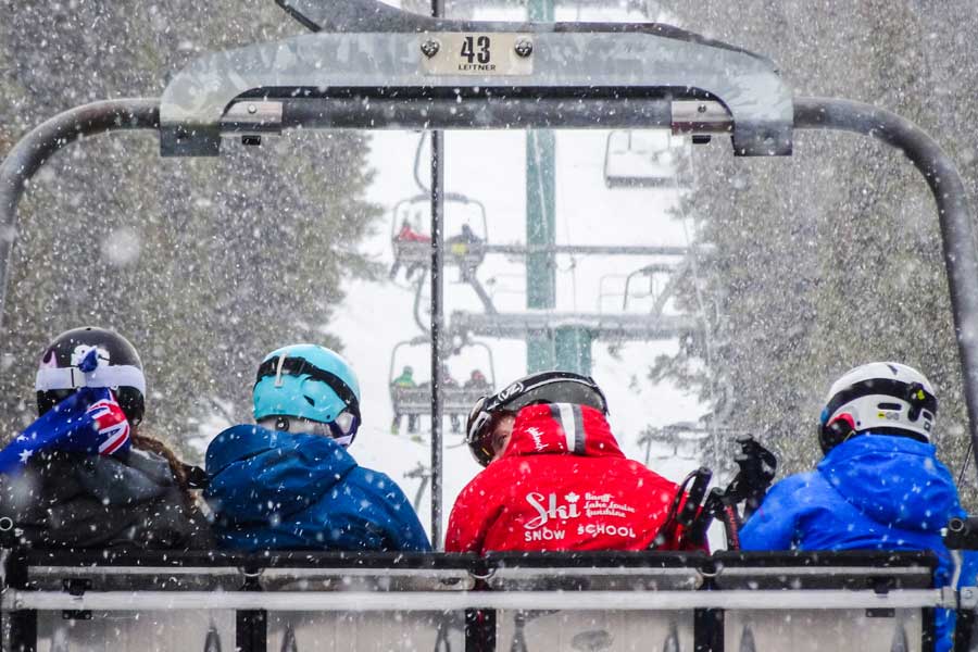 Riding up a chairlift soaking up advice from a Nonstop coach.