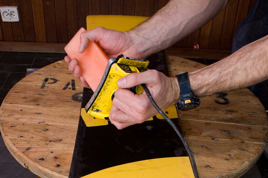 How to wax and tune your snowboard at home