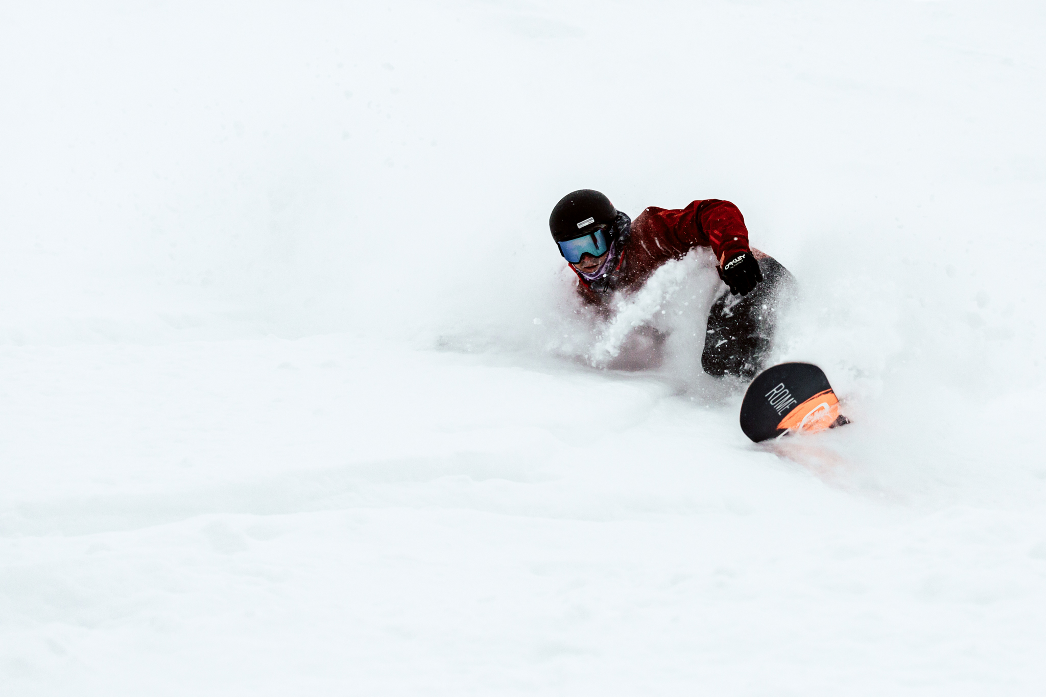 Surfing through feather-light pow.